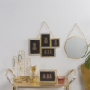 Gold Edged Mirror round on wall